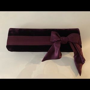 Purple velvet clutch with bow